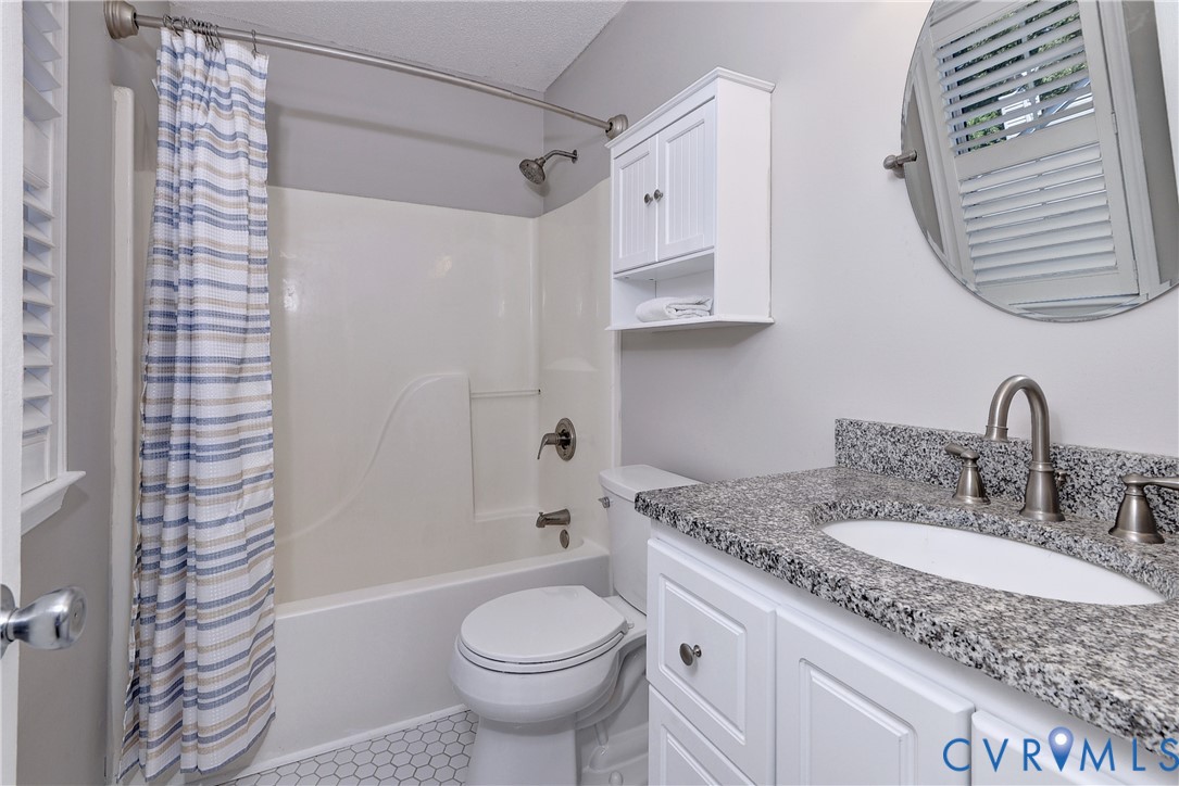 5912 Allegheny Road Williamsburg, VA 23188 - Photo 20 of 38 Primary Bathroom, featuring tile floor, stone coun
