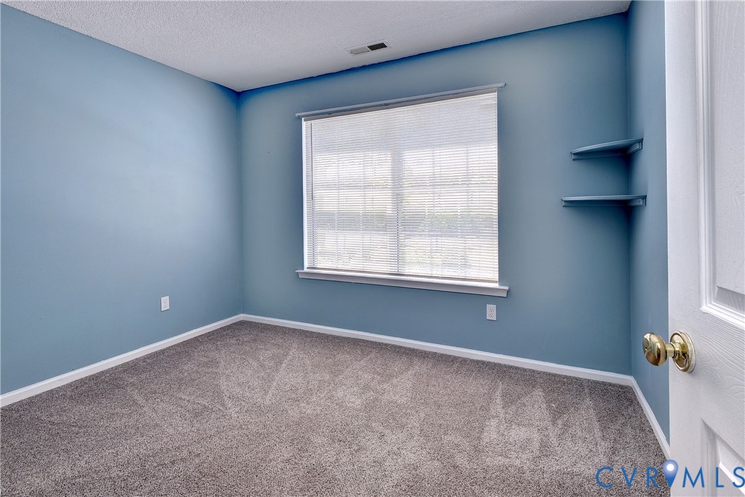 5912 Allegheny Road Williamsburg, VA 23188 - Photo 23 of 38 Bedroom three with carpet