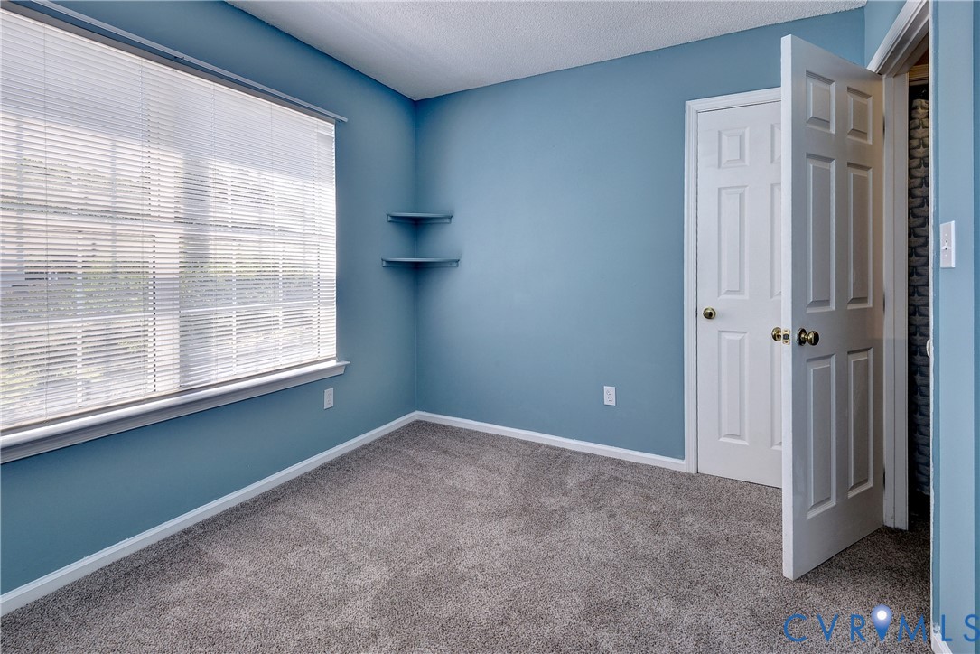 5912 Allegheny Road Williamsburg, VA 23188 - Photo 24 of 38 Bedroom three with carpet