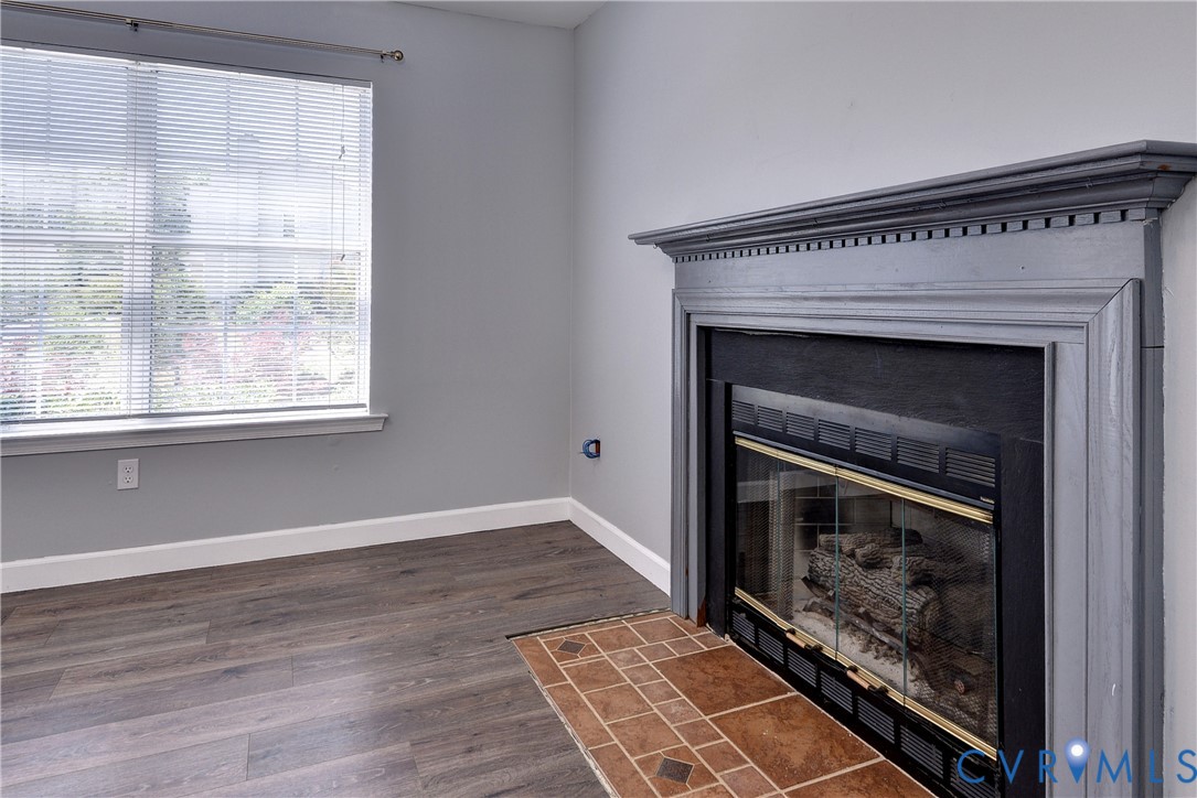 5912 Allegheny Road Williamsburg, VA 23188 - Photo 5 of 38 Large open Living room with LVP, natural gas firep