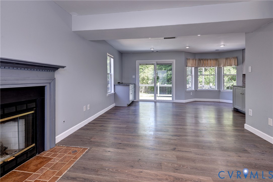 5912 Allegheny Road Williamsburg, VA 23188 - Photo 7 of 38 Large open Living room with LVP, natural gas firep