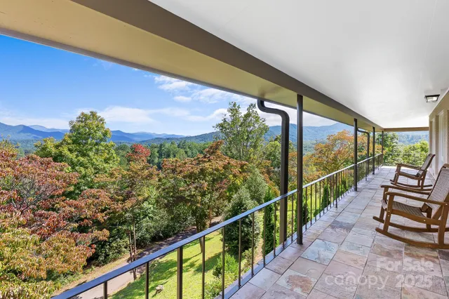 a view of balcony with chairs