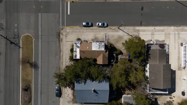 an aerial view of a residential houses