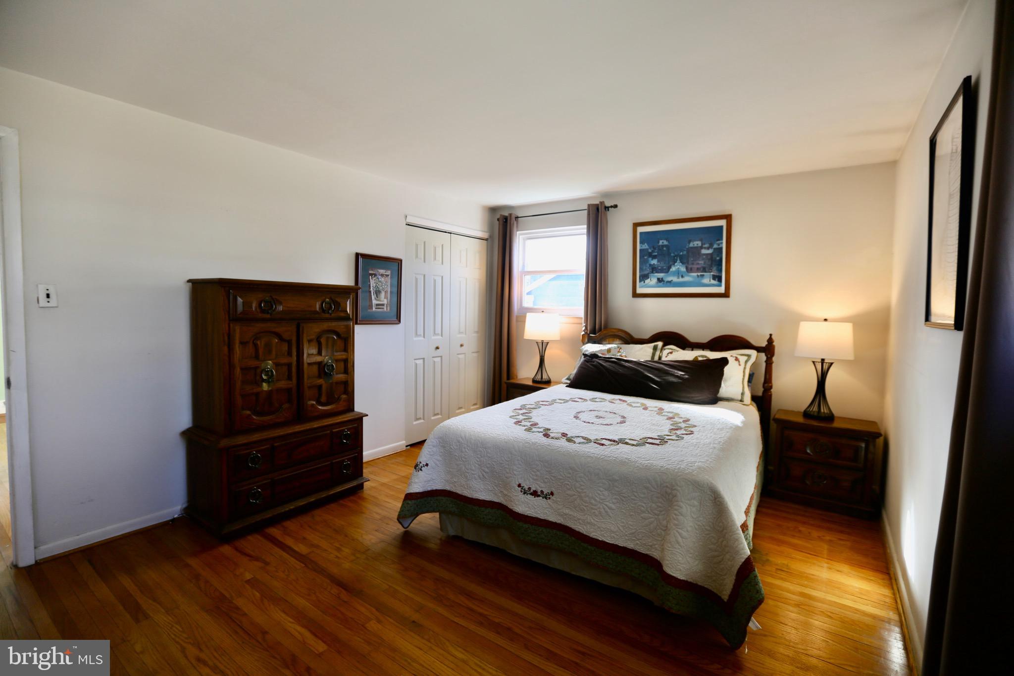 242 Tilford Road Somerdale, NJ 08083 - Photo 13 of 29 a bedroom with a bed and a dresser