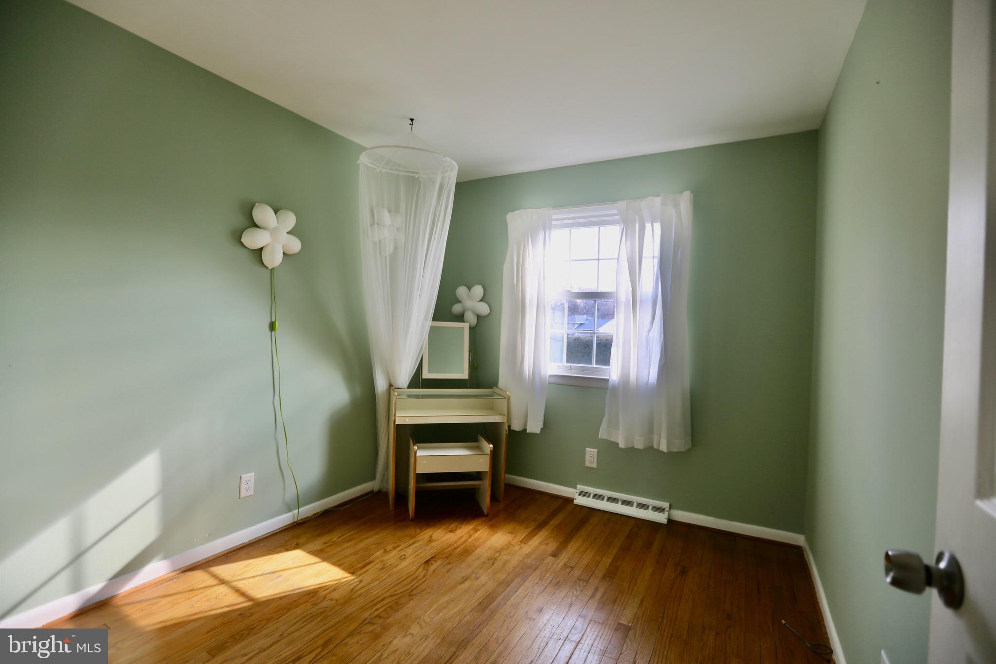 242 Tilford Road Somerdale, NJ 08083 - Photo 16 of 29 a view of room with window and wooden floor