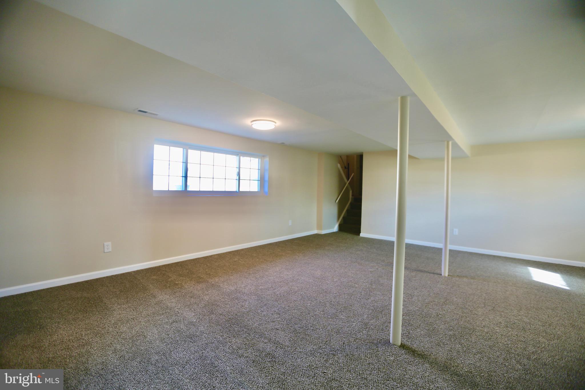 242 Tilford Road Somerdale, NJ 08083 - Photo 17 of 29 a view of an empty room with a window