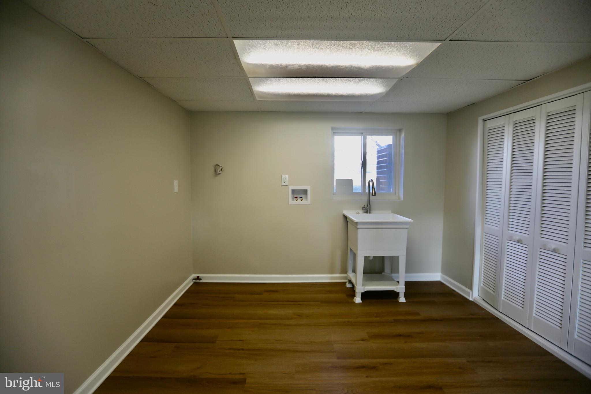 242 Tilford Road Somerdale, NJ 08083 - Photo 21 of 29 a view of a room with wooden floor and chair