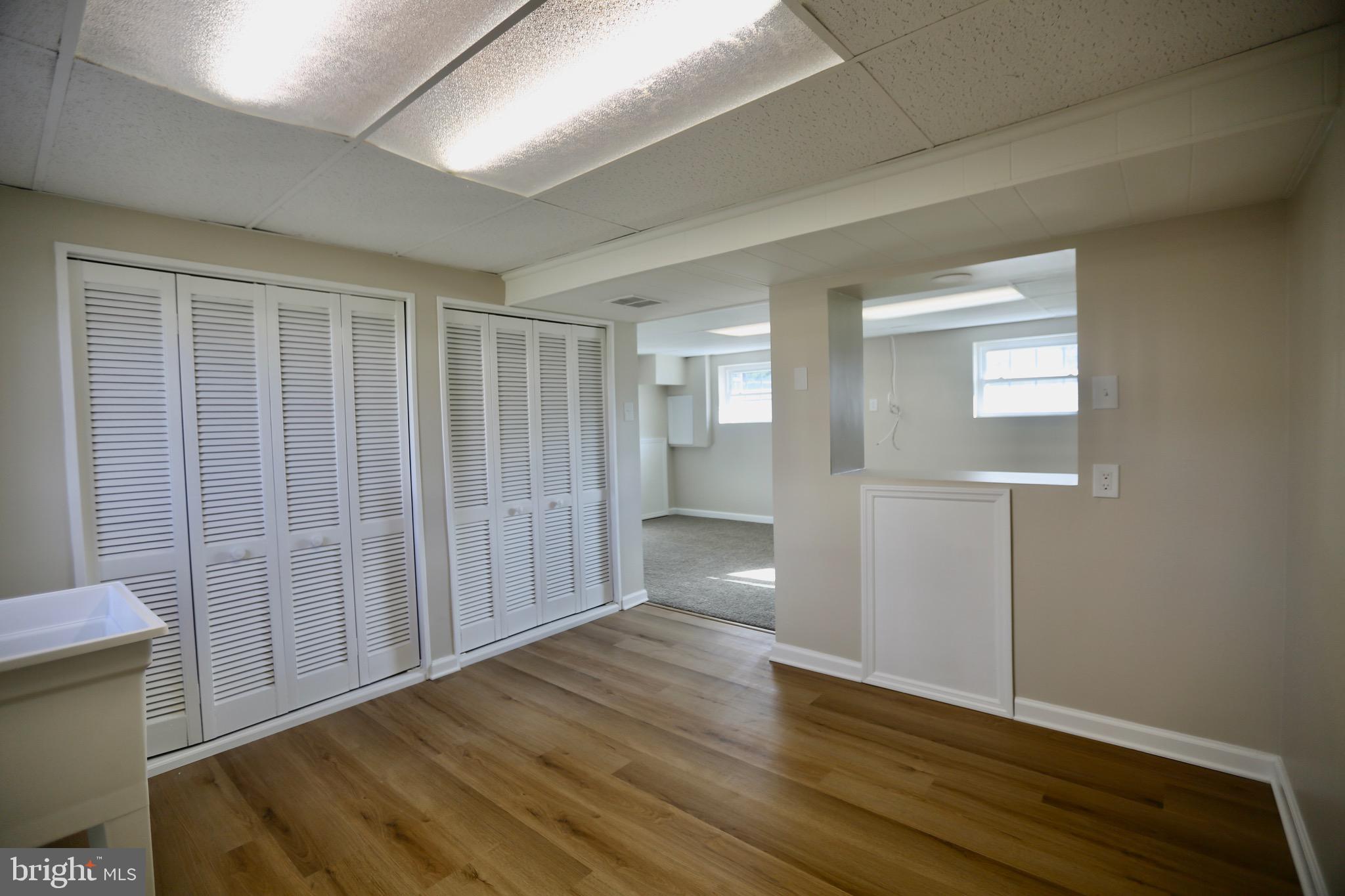 242 Tilford Road Somerdale, NJ 08083 - Photo 23 of 29 a view of empty room with wooden floor and fan