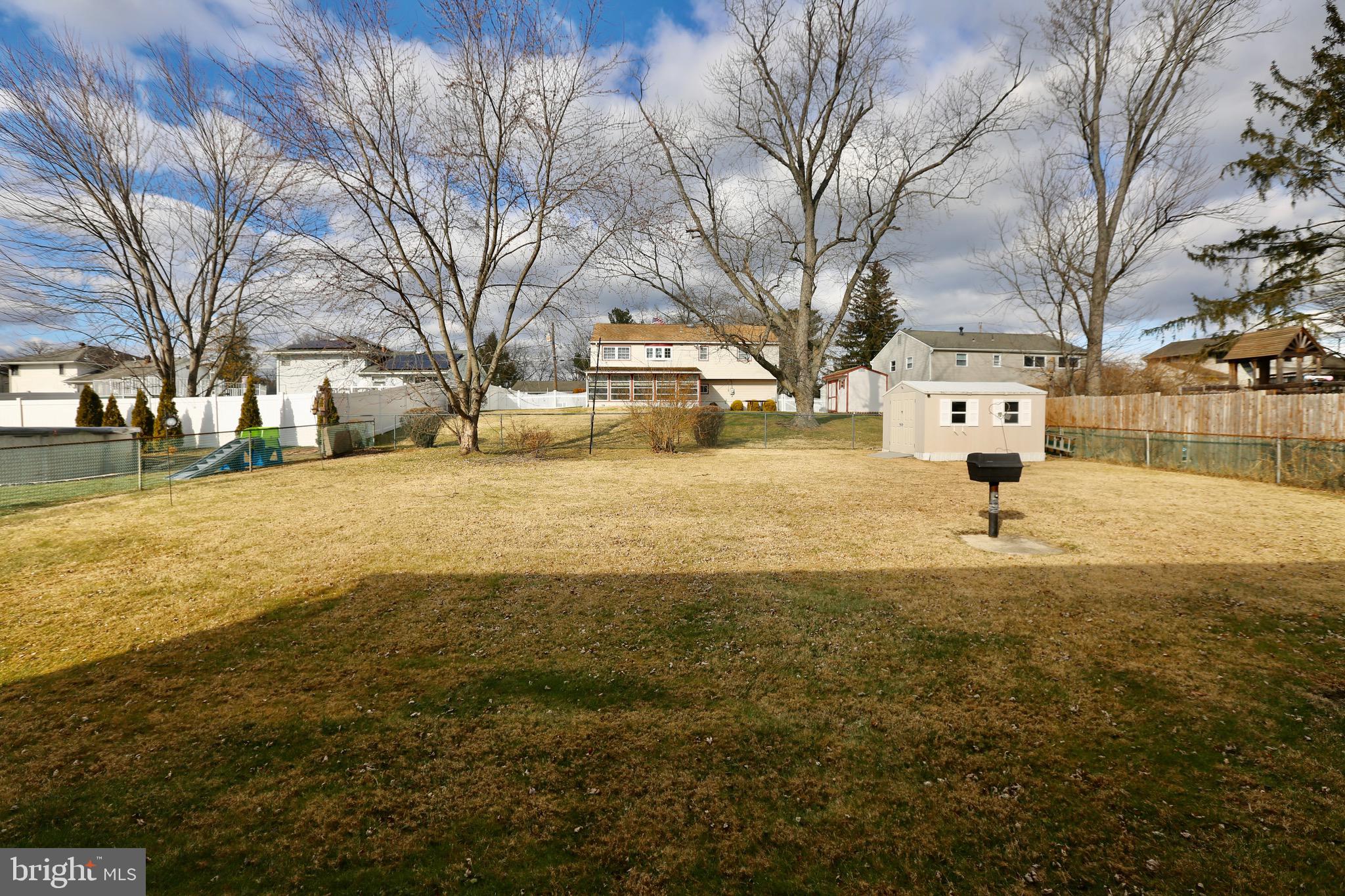 242 Tilford Road Somerdale, NJ 08083 - Photo 27 of 29 a street view with residential house and trees