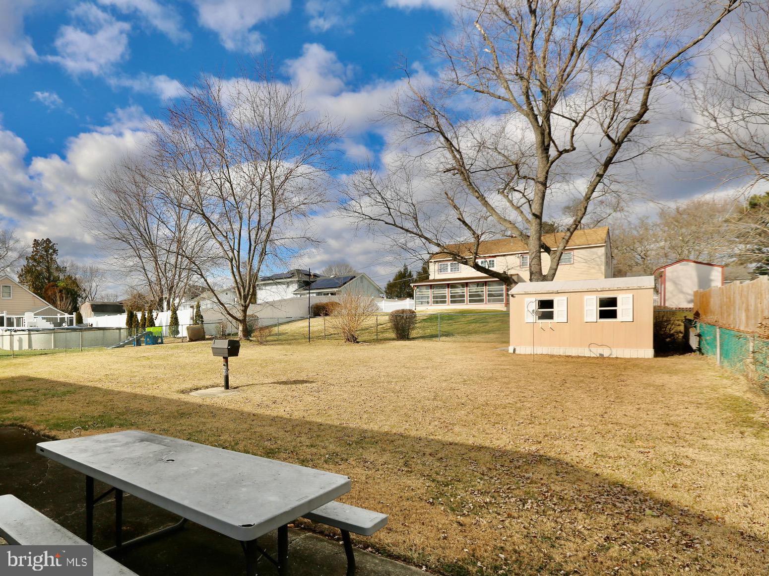 242 Tilford Road Somerdale, NJ 08083 - Photo 29 of 29 a view of a yard with snow on the road