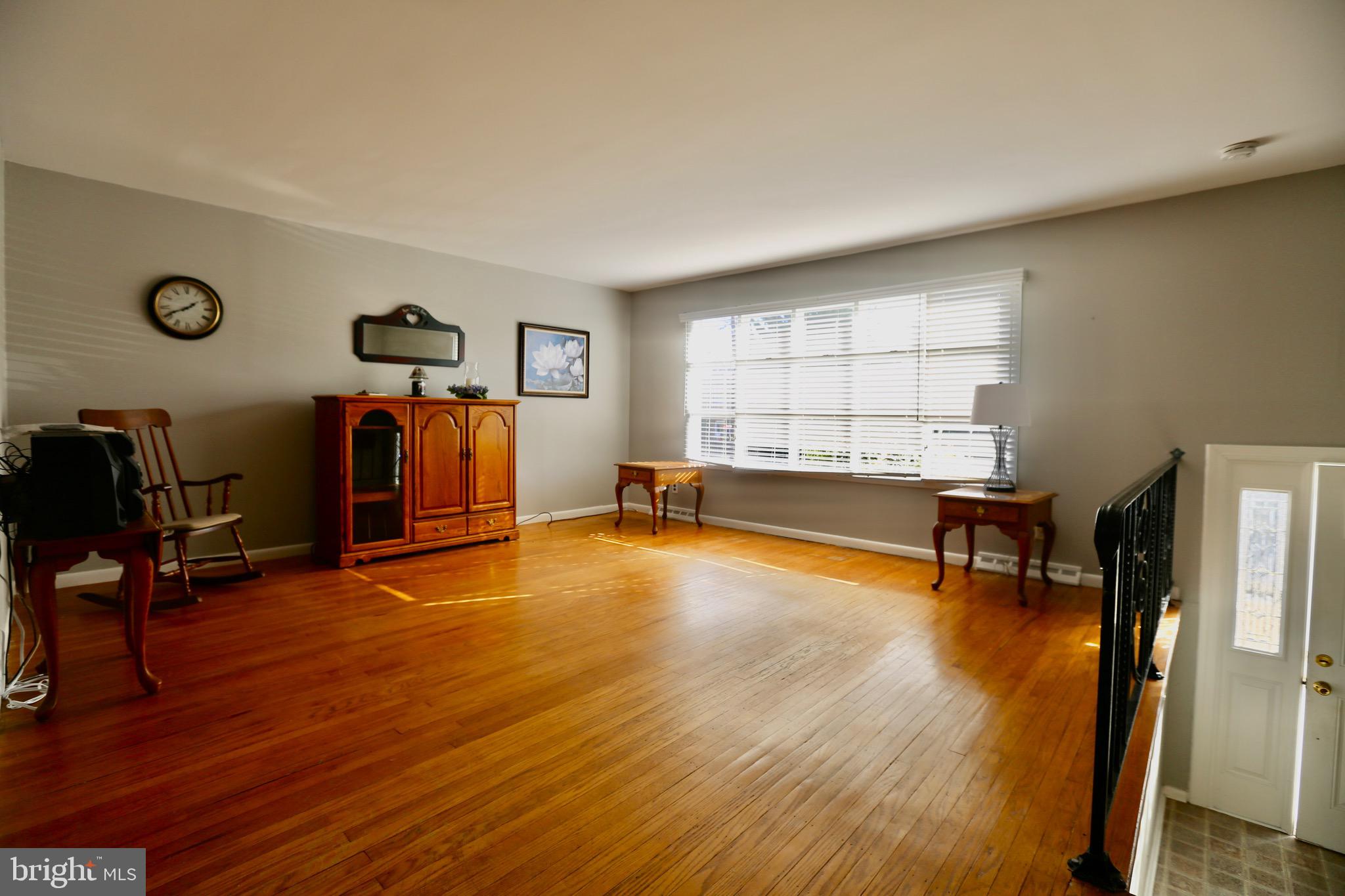 242 Tilford Road Somerdale, NJ 08083 - Photo 4 of 29 a living room with furniture and a wooden floor