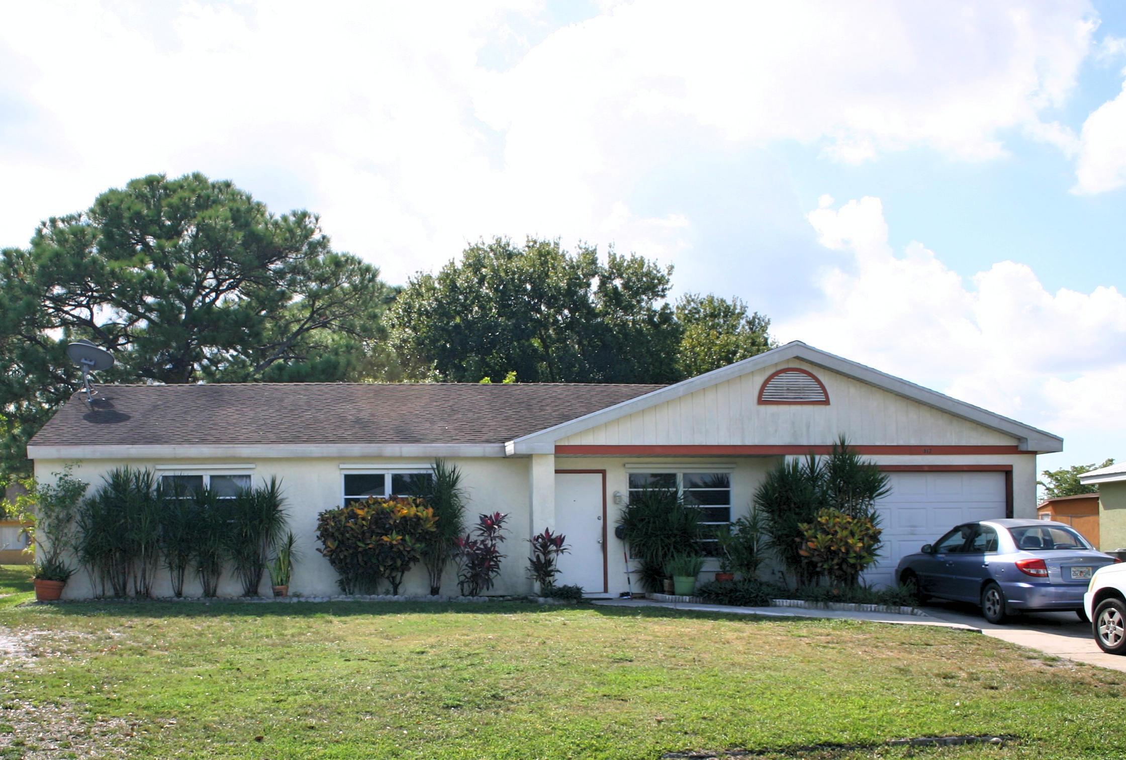 417 Southwest Kentwood Road Port St. Lucie, FL 34953 - Photo 2 of 18 Front of house 2
