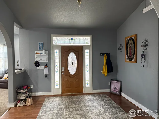 a view of a hallway with washer and dryer