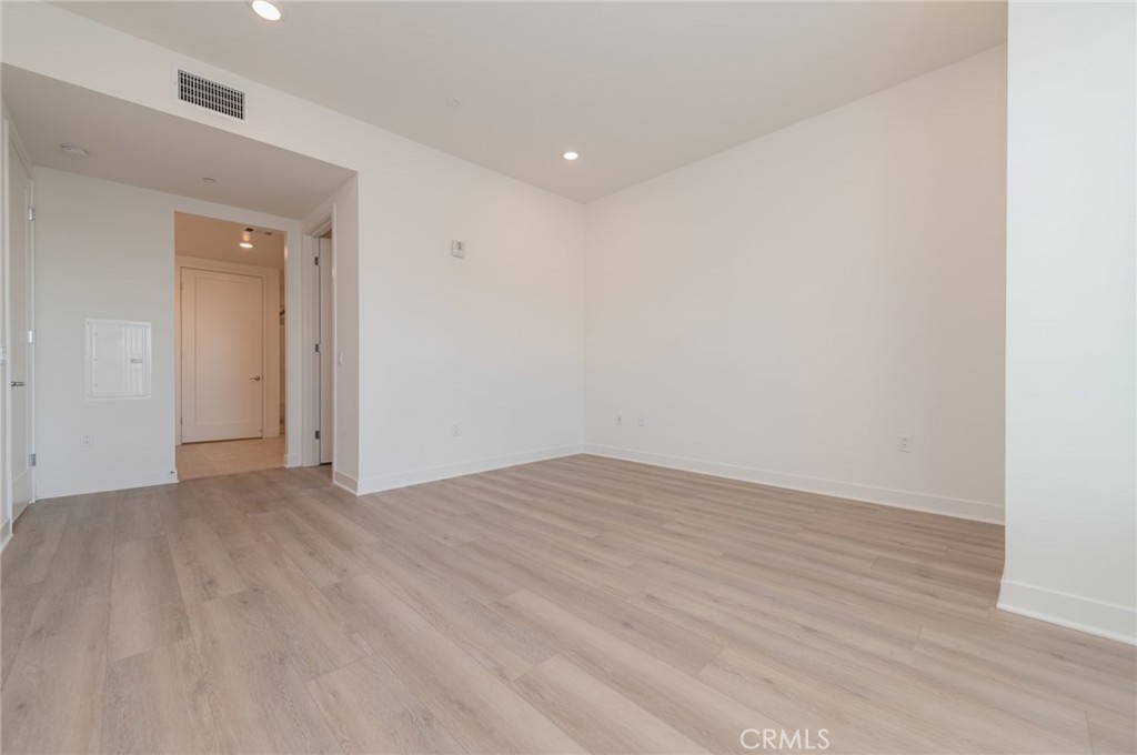 1703 Rivington Irvine, CA 92612 - Photo 11 of 42 a view of empty room with wooden floor