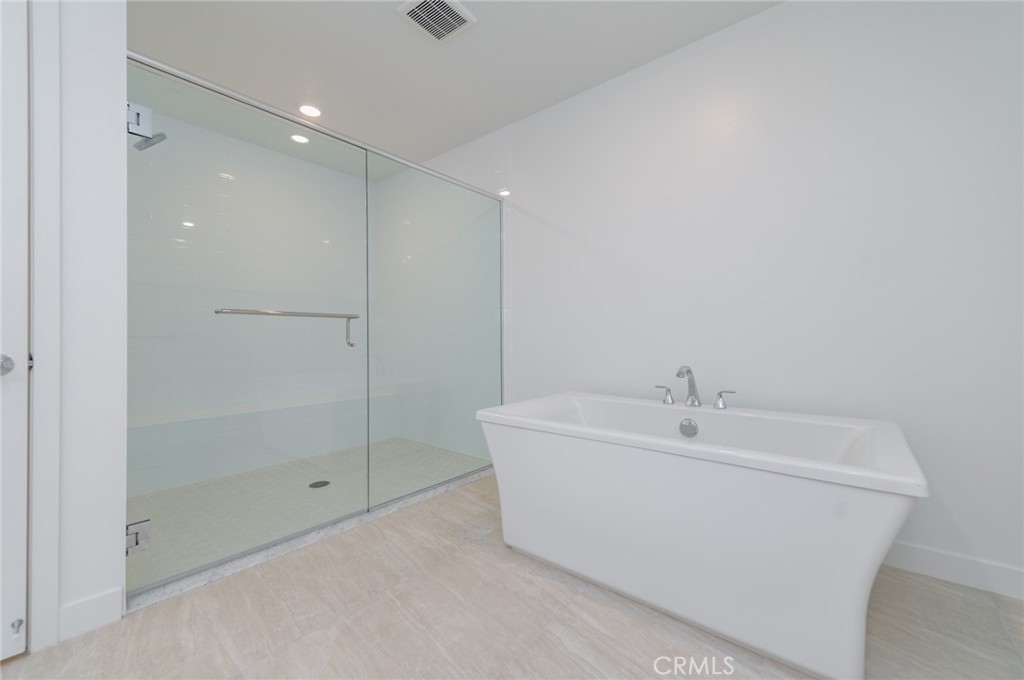 1703 Rivington Irvine, CA 92612 - Photo 13 of 42 a bathroom with a bathtub
