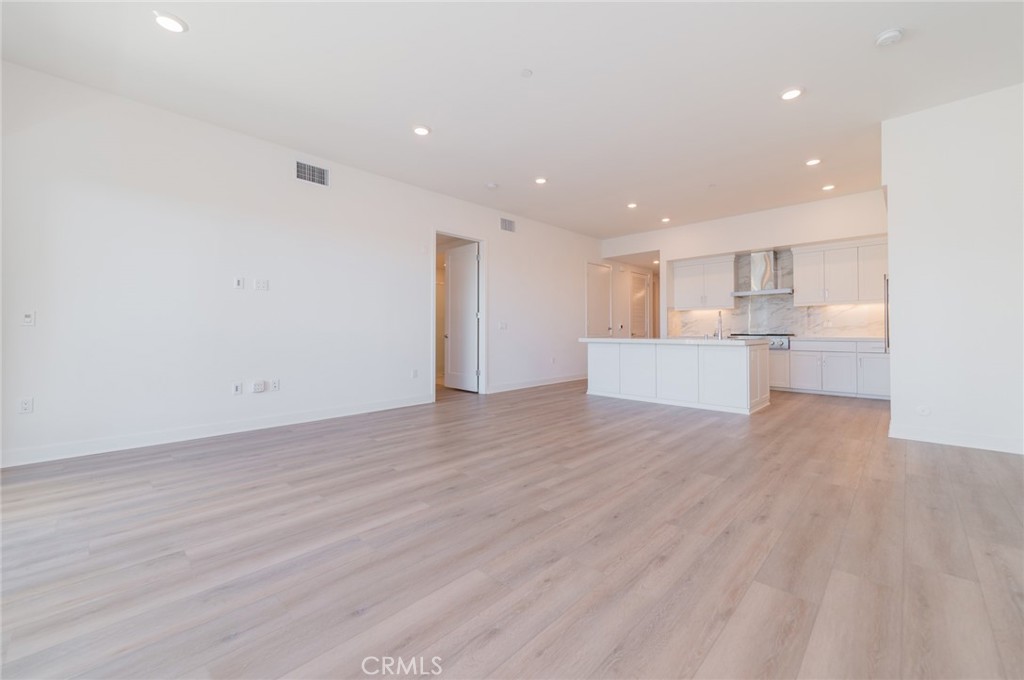 1703 Rivington Irvine, CA 92612 - Photo 15 of 42 a view of a kitchen with wooden floor