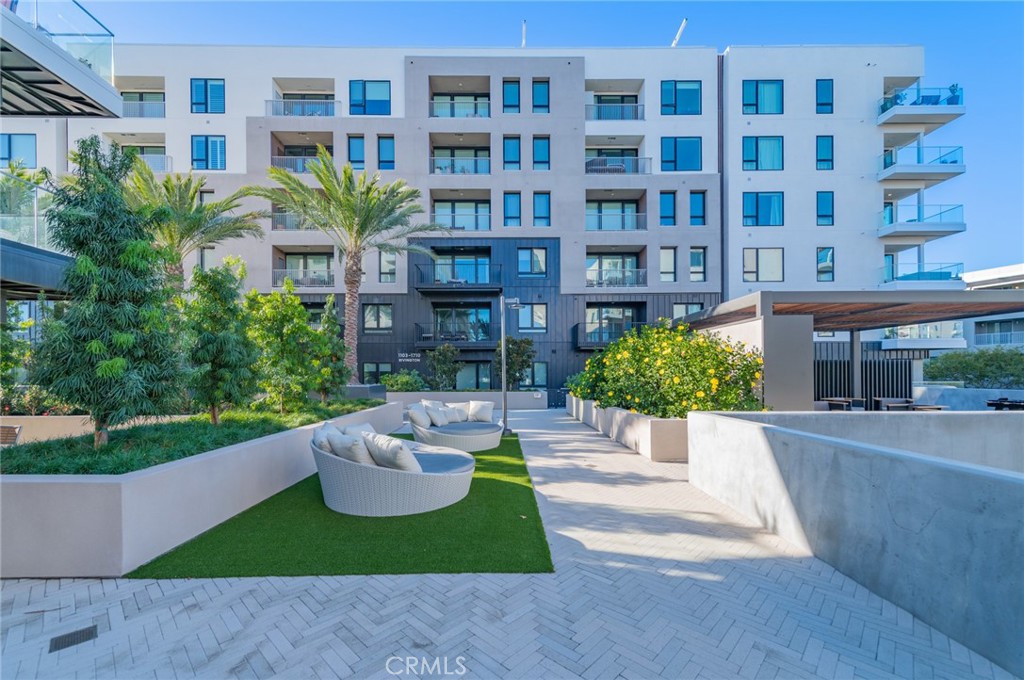 1703 Rivington Irvine, CA 92612 - Photo 28 of 42 a view of a building with garden