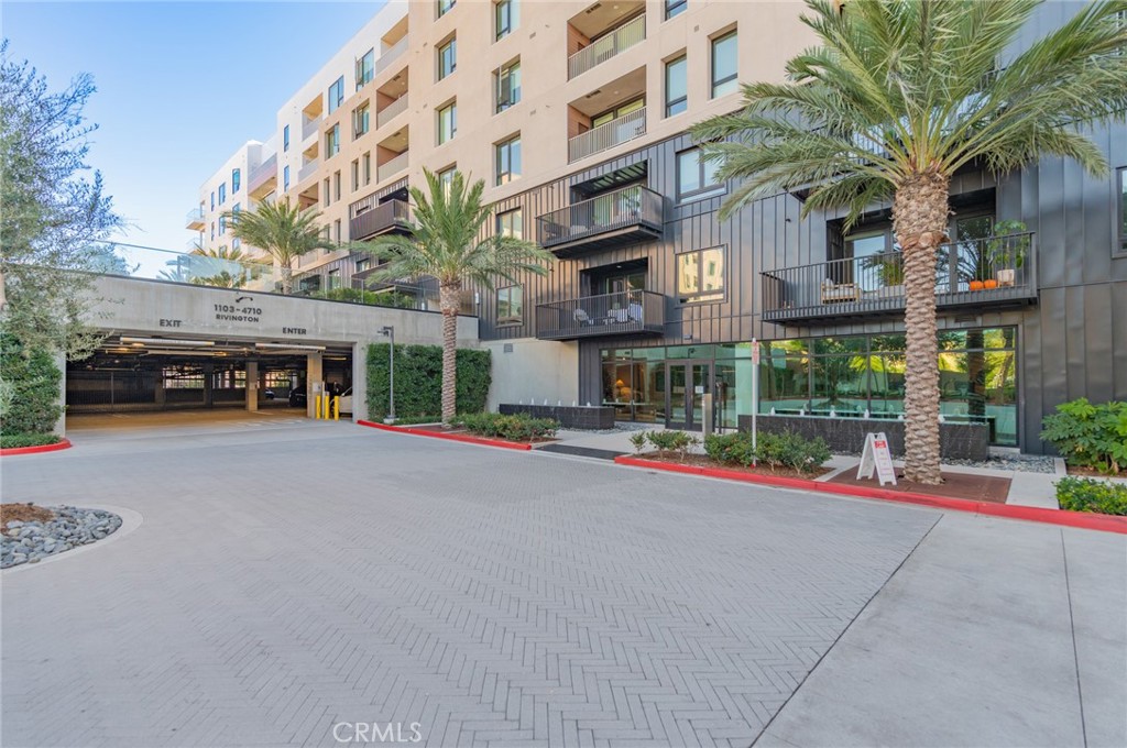 1703 Rivington Irvine, CA 92612 - Photo 34 of 42 front view of a building with a garden and plants
