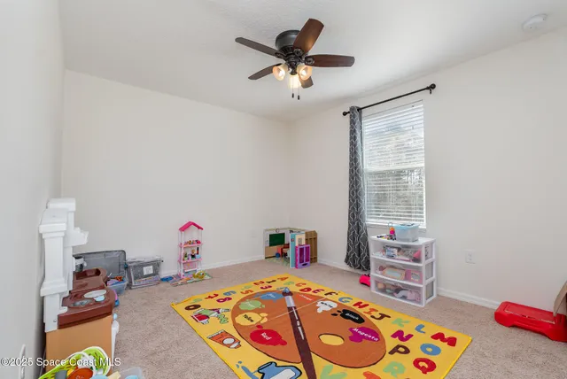 a utility room with furniture and a garage