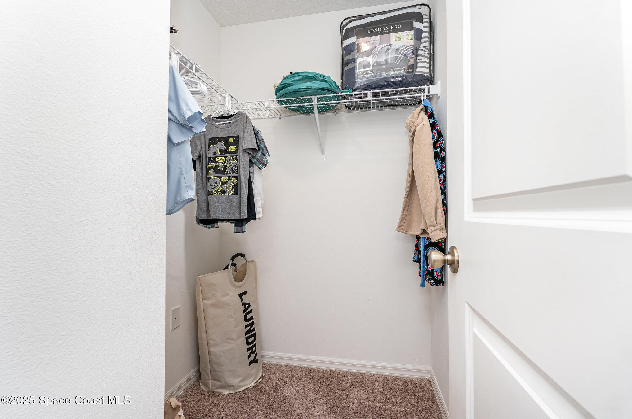 352 Gordon Road Northwest Palm Bay, FL 32907 - Photo 42 of 71 a view of storage and utility room