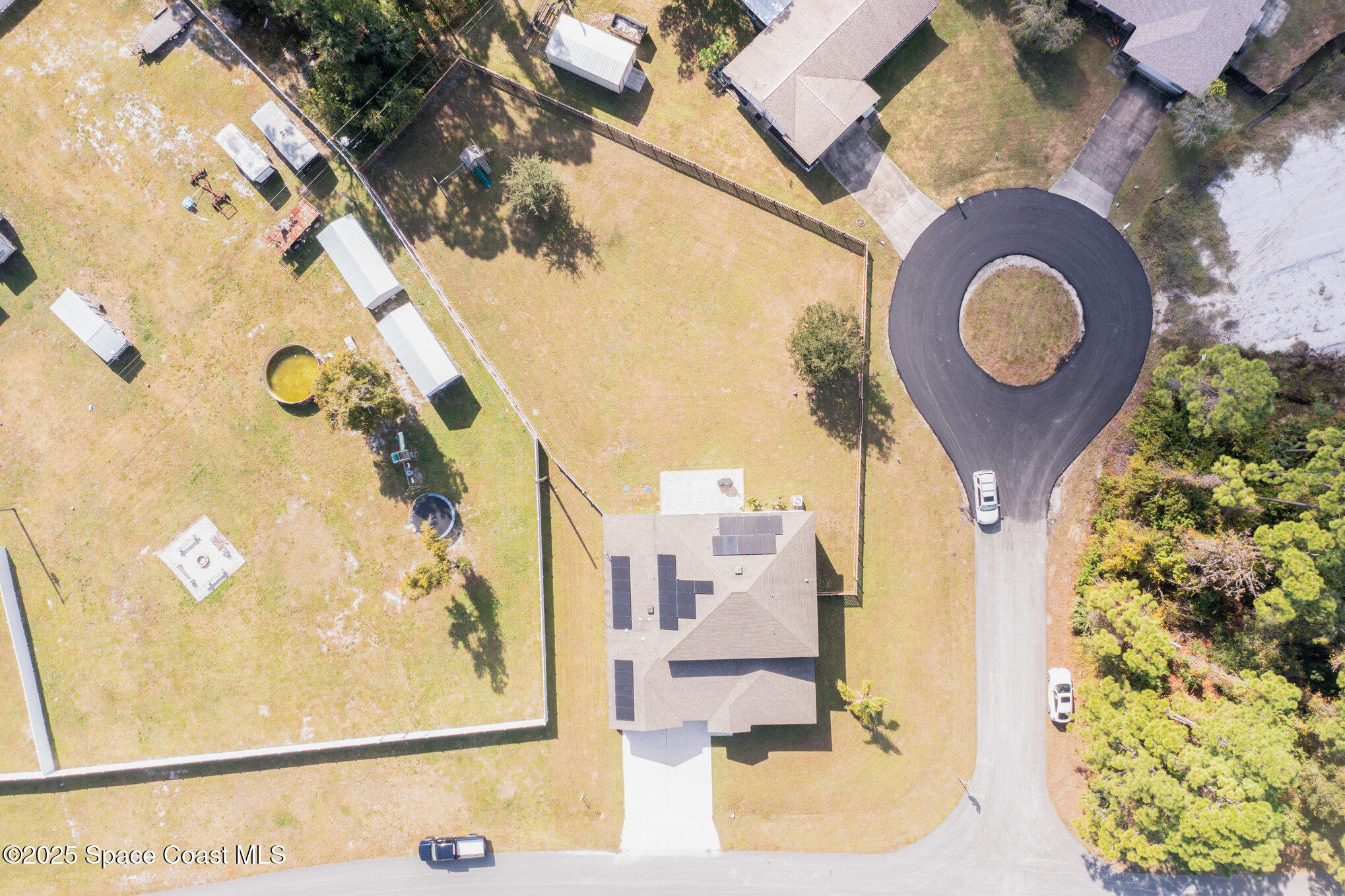 352 Gordon Road Northwest Palm Bay, FL 32907 - Photo 62 of 71 a picture of a bathroom with a sink and mirror