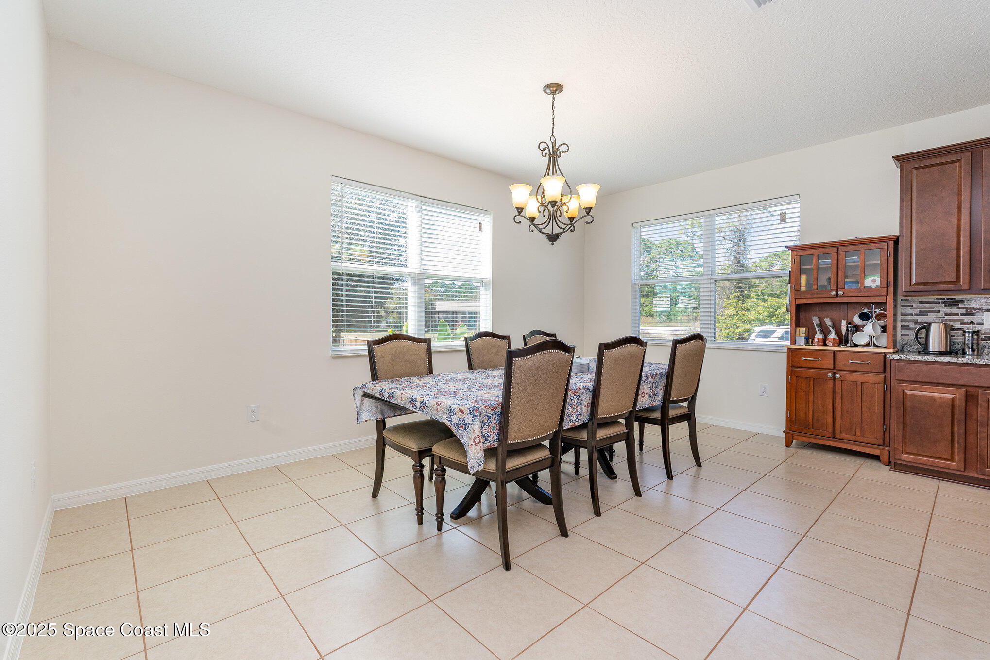 352 Gordon Road Northwest Palm Bay, FL 32907 - Photo 9 of 71 a view of a dining room with furniture