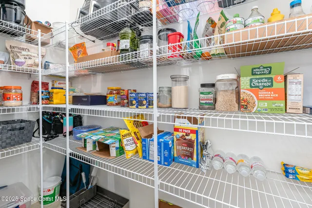 a bathroom with a sink a mirror and vanity