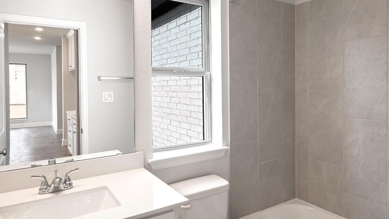 285 Prickly Poppy Loop Kyle, TX 78640 - Photo 18 of 40 Bathroom featuring vanity and tub / shower combination