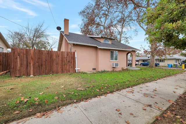 a kitchen with cabinets appliances and a sink
