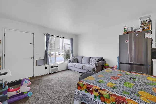 a view of a backyard with sitting area