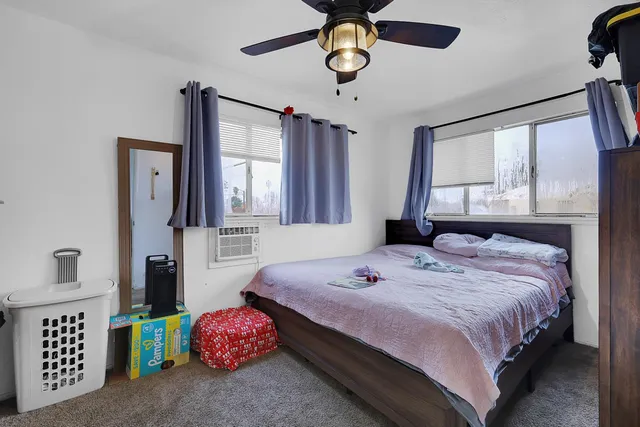 a kitchen with stainless steel appliances granite countertop a stove a sink dishwasher and a refrigerator