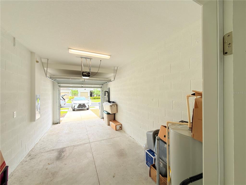 253 Tulip Banded Way Ruskin, FL 33570 - Photo 11 of 20 a room with storage and utility