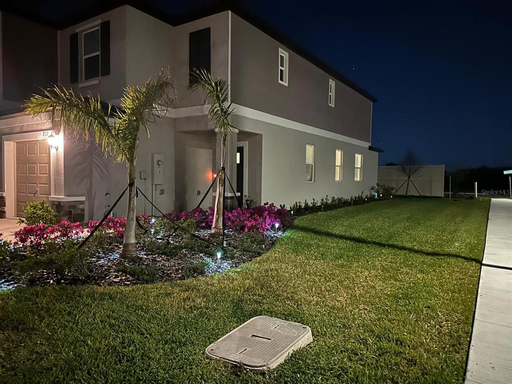 253 Tulip Banded Way Ruskin, FL 33570 - Photo 3 of 20 a front view of a house with a yard
