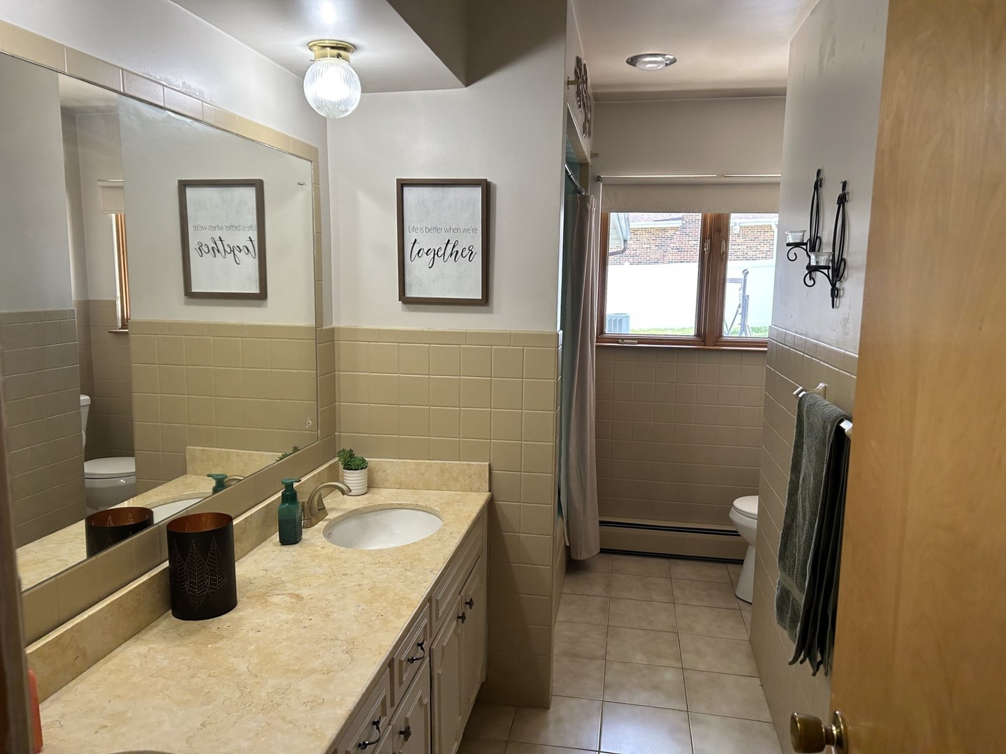 900 Read Street Lockport, IL 60441 - Photo 18 of 23 a bathroom with a sink and mirror