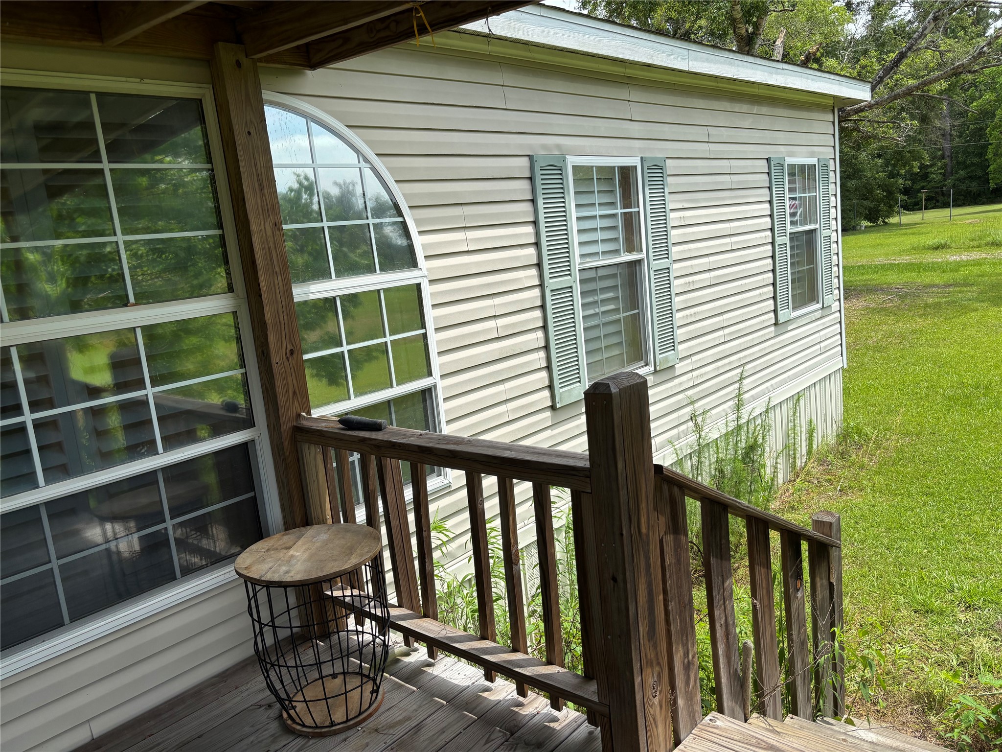 35599 State Highway South Buna, TX 77612 - Photo 6 of 40 a front view of a house with a porch