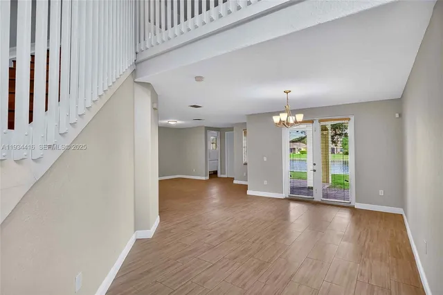 a bathroom with a sink toilet and mirror