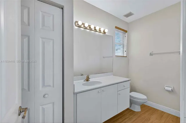 a picture of a bathroom with a shower