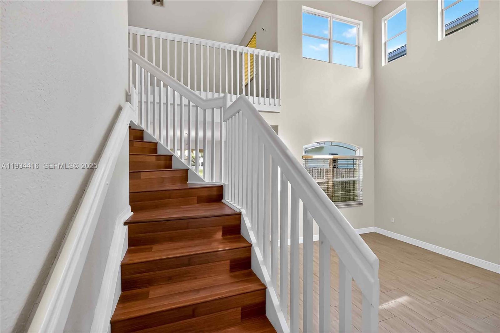 8955 Southwest 207th Street Cutler Bay, FL 33189 - Photo 8 of 51 stairs, loft overlooking 1st flkoor
