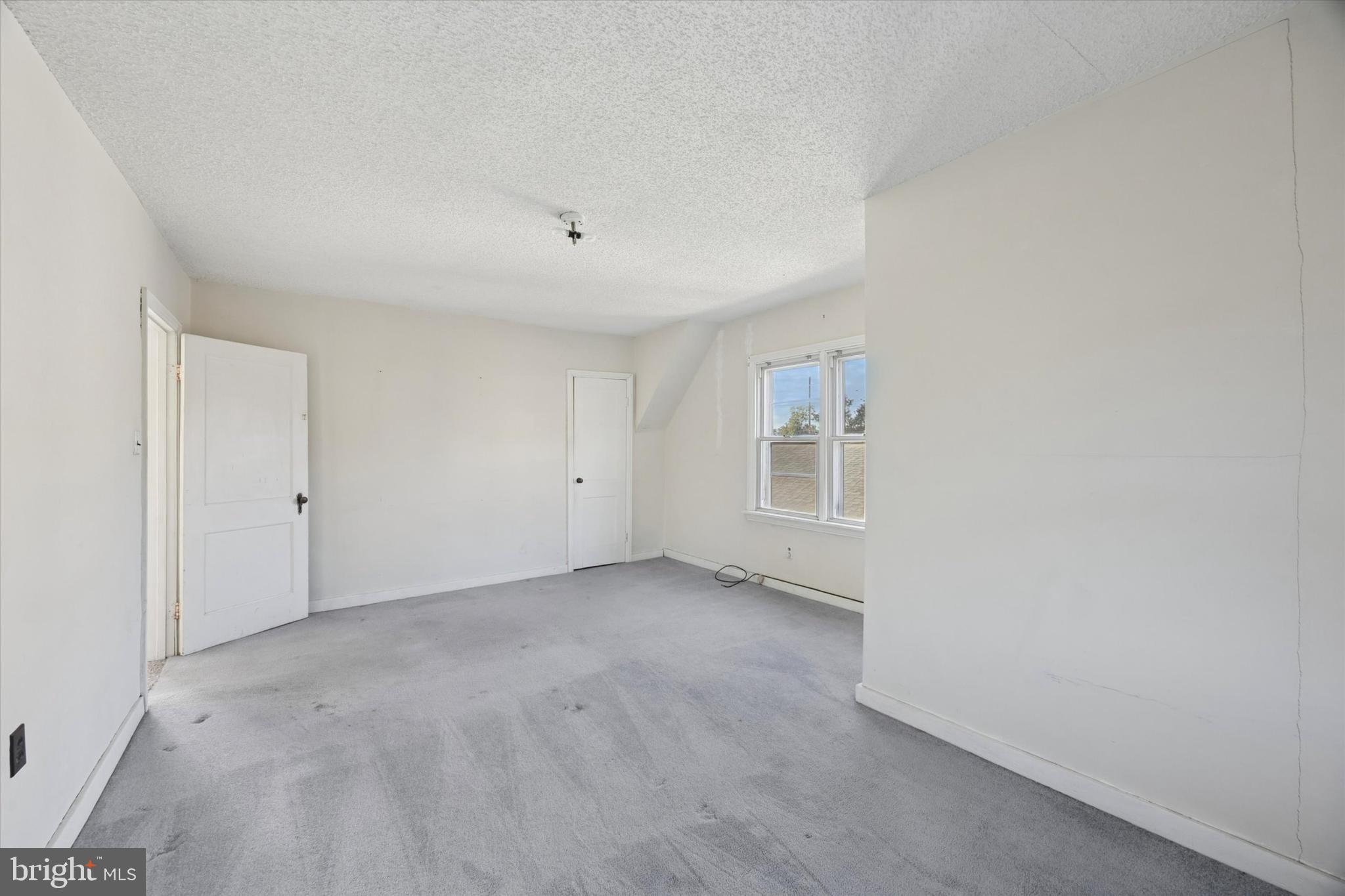 1102 Primos Avenue Secane, PA 19018 - Photo 13 of 21 a view of an empty room with a window
