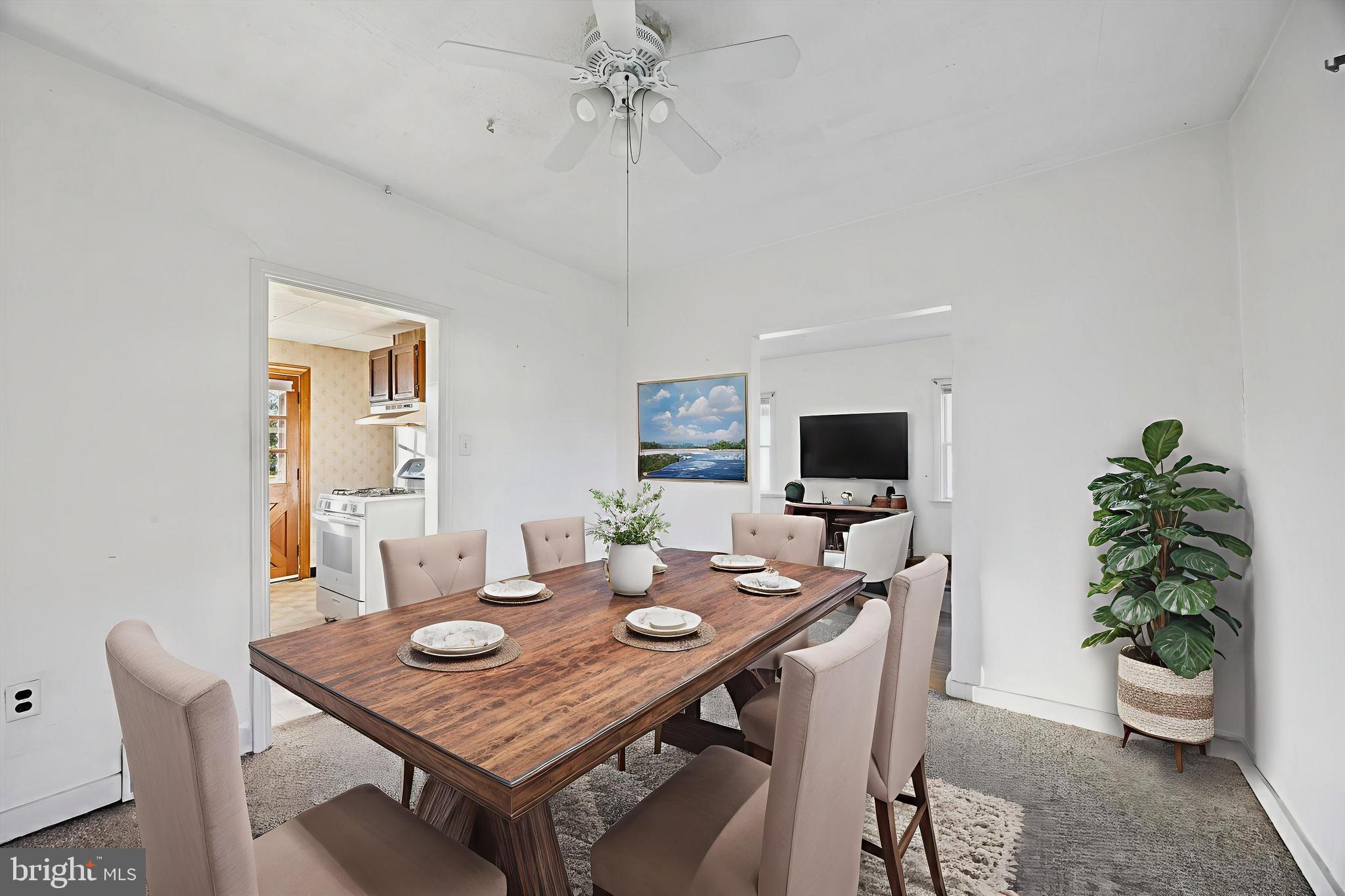 1102 Primos Avenue Secane, PA 19018 - Photo 4 of 21 a view of a dining room with a table and chairs