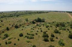 Tbd East 1420 Road Mangum, OK 73571 - Photo 16 of 40 a view of a lake with a mountain