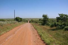 Tbd East 1420 Road Mangum, OK 73571 - Photo 19 of 40 a view of a road with a yard