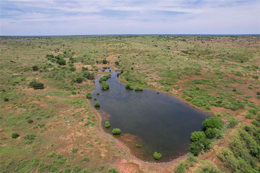 Tbd East 1420 Road Mangum, OK 73571 - Photo 21 of 40 a view of a yard with an ocean view