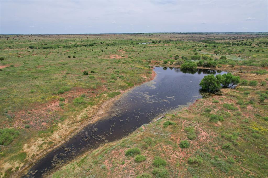 Tbd East 1420 Road Mangum, OK 73571 - Photo 28 of 40 a view of a yard with an outdoor space