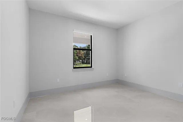 a bathroom with a shower a toilet and sink