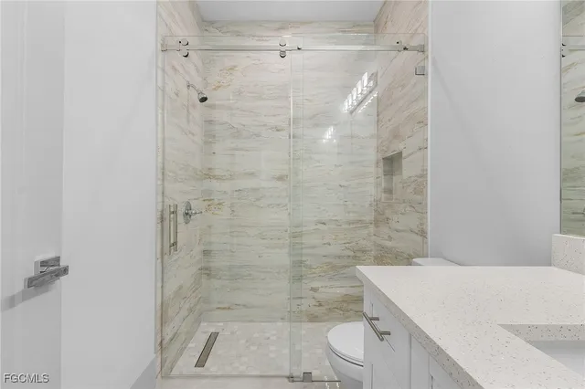 a view of a swimming pool with a yard