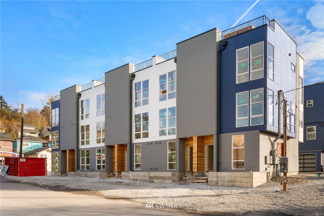 2403 Southwest Edmunds Street Seattle, WA 98106 - Photo 3 of 7 a front view of a multi story building