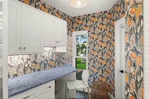 a view of entryway with wooden floor