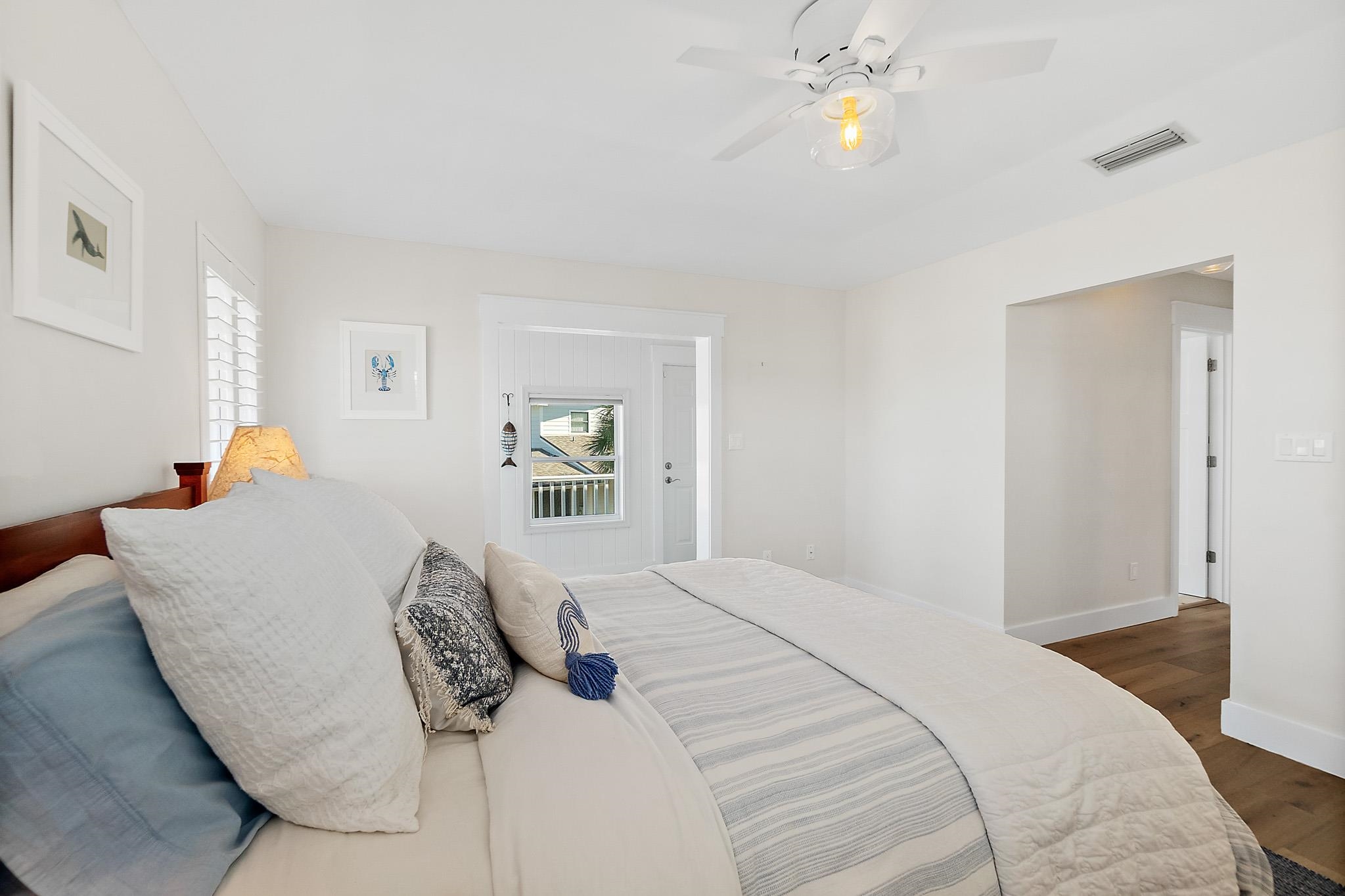 7 Sabor De Sal Road St. Augustine, FL 32080 - Photo 21 of 59 Owners' bedroom with on-suite bath, sitting area, and access to wrap-around deck.