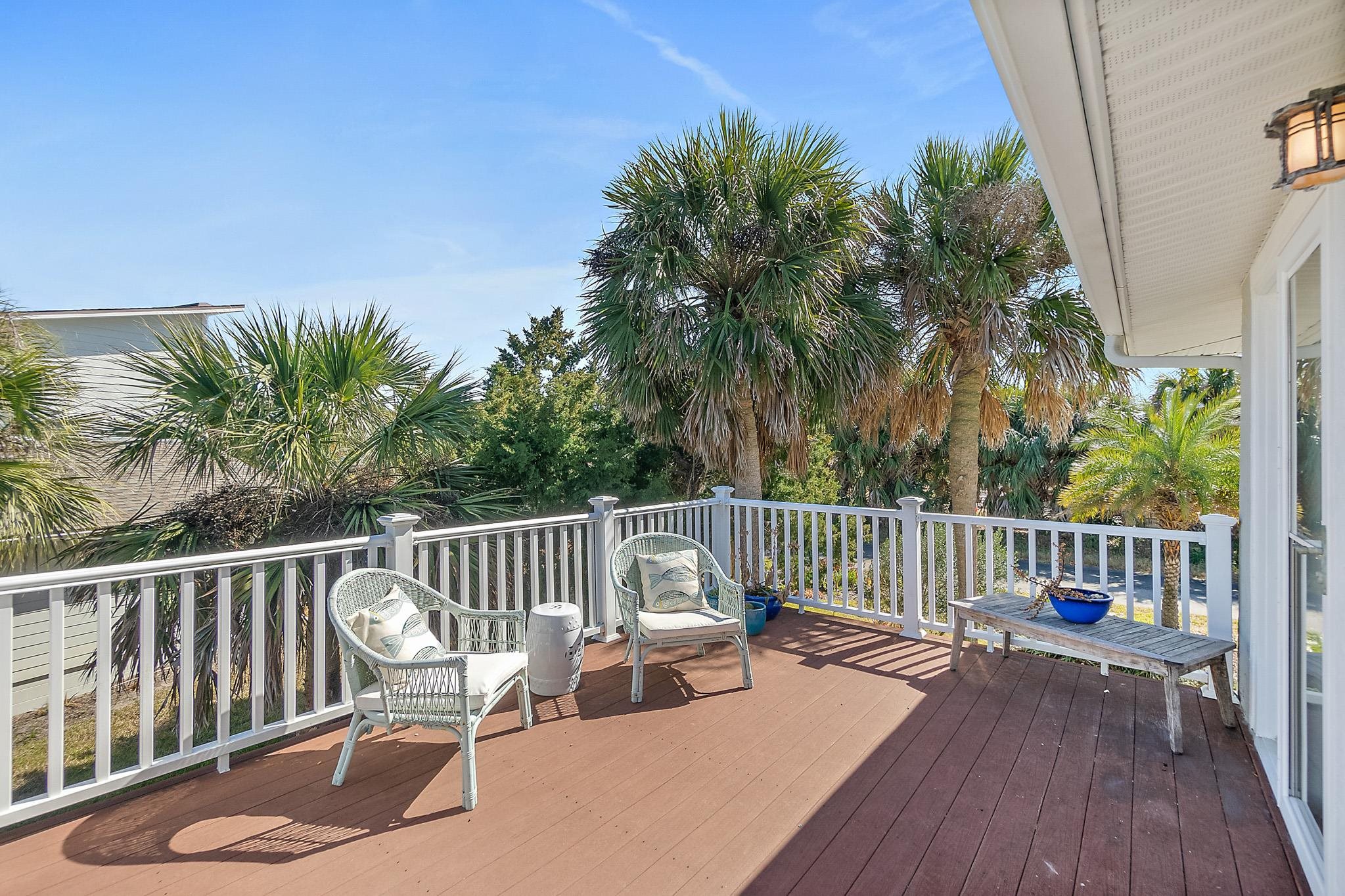 7 Sabor De Sal Road St. Augustine, FL 32080 - Photo 26 of 59 Wrap-around deck with access from living area or primary bedroom with a view to the pond
